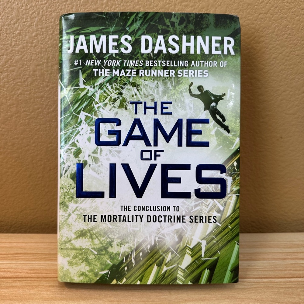 'The Game of Lives' Hardcover Book - Green Cover